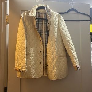Light yellow Burberry quilted jacket. Size small.
